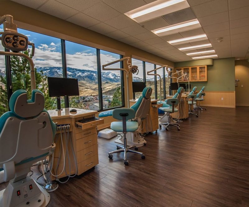 Modern dental office with mountain view through large windows